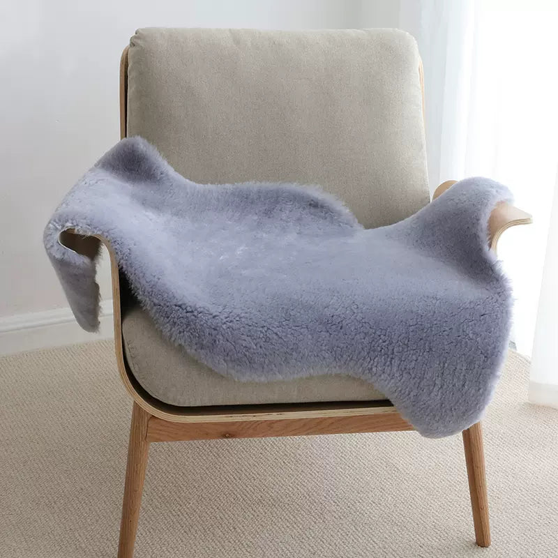 Sheep shearing colored sheepskin